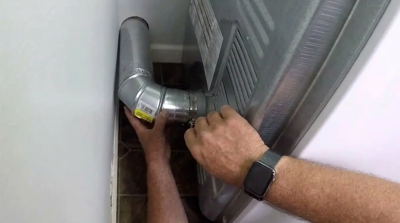 Proper dryer vent hookup with metal duct and short straight connection behind dryer